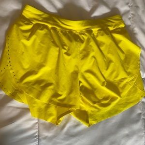 Yellow Lululemon “Find Your Pace” shorts